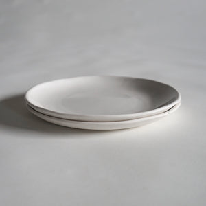 stack of 2 10" white porcelain dinner plates