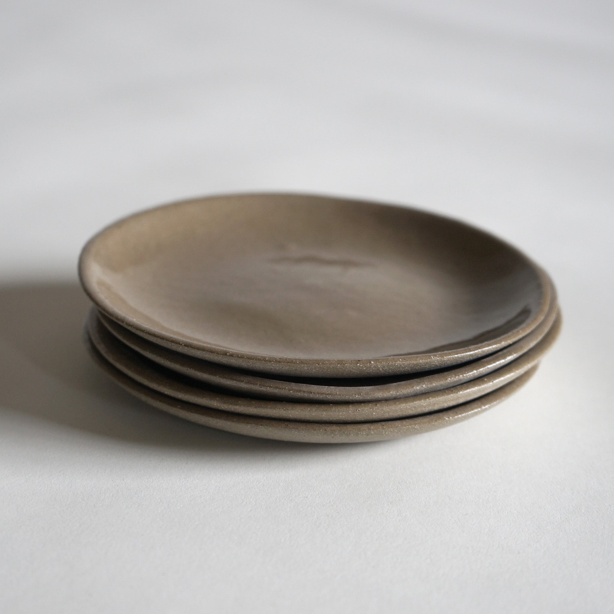 stack of 4 oatmeal stone 6.5" side plates
