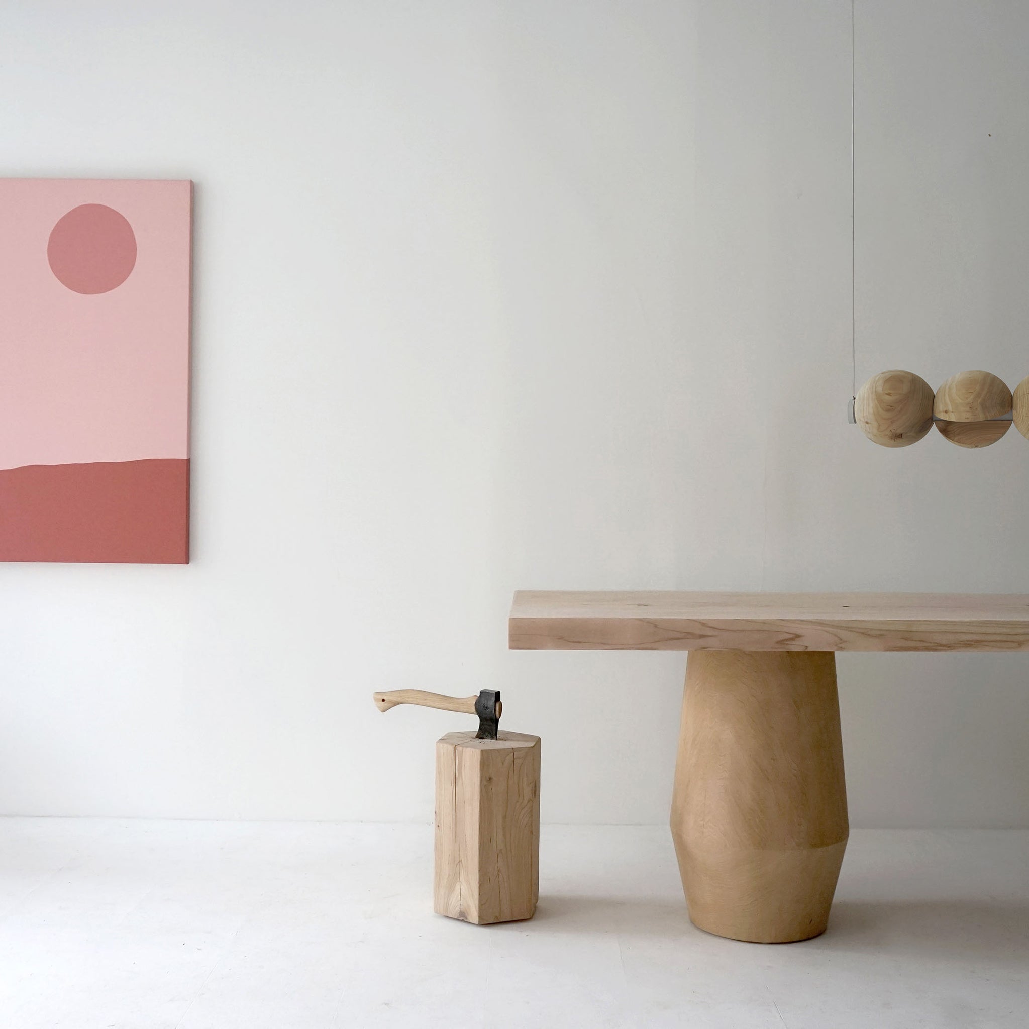 Smokestack dining table with the core light and hex stool