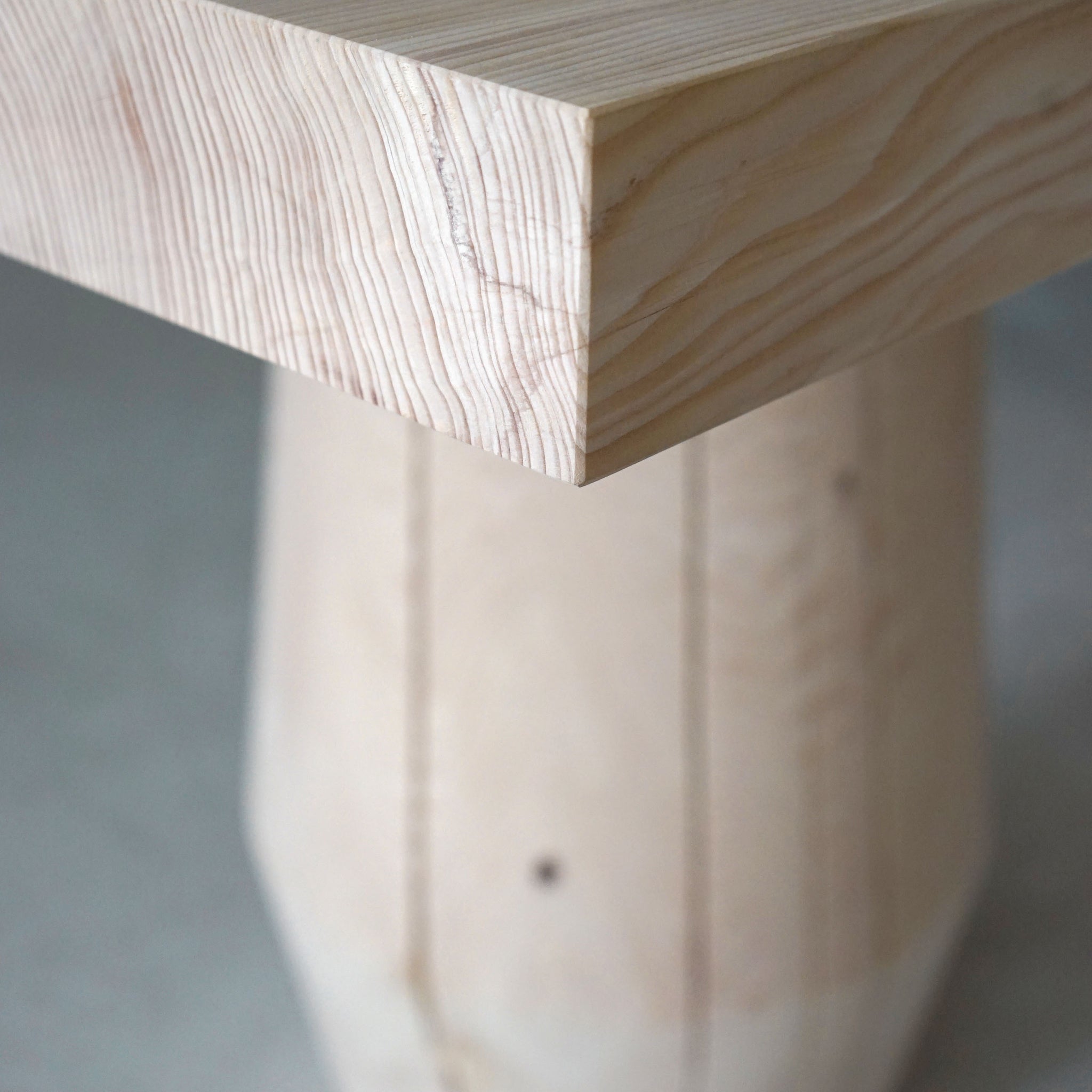 Edge and corner detail of the smoke stack dining table