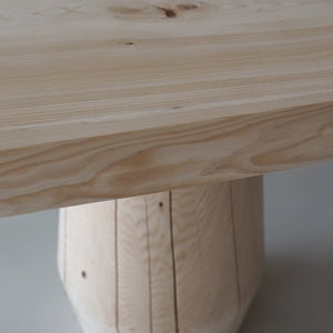 edge and top detail of smokestack dining table