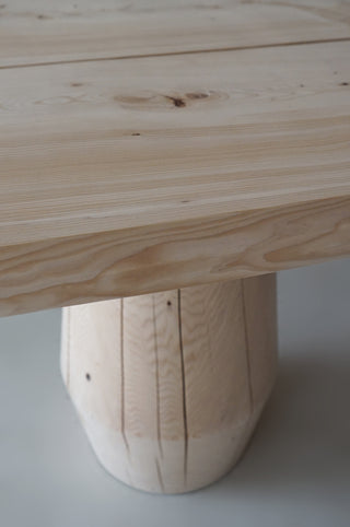 edge and top detail of smokestack dining table