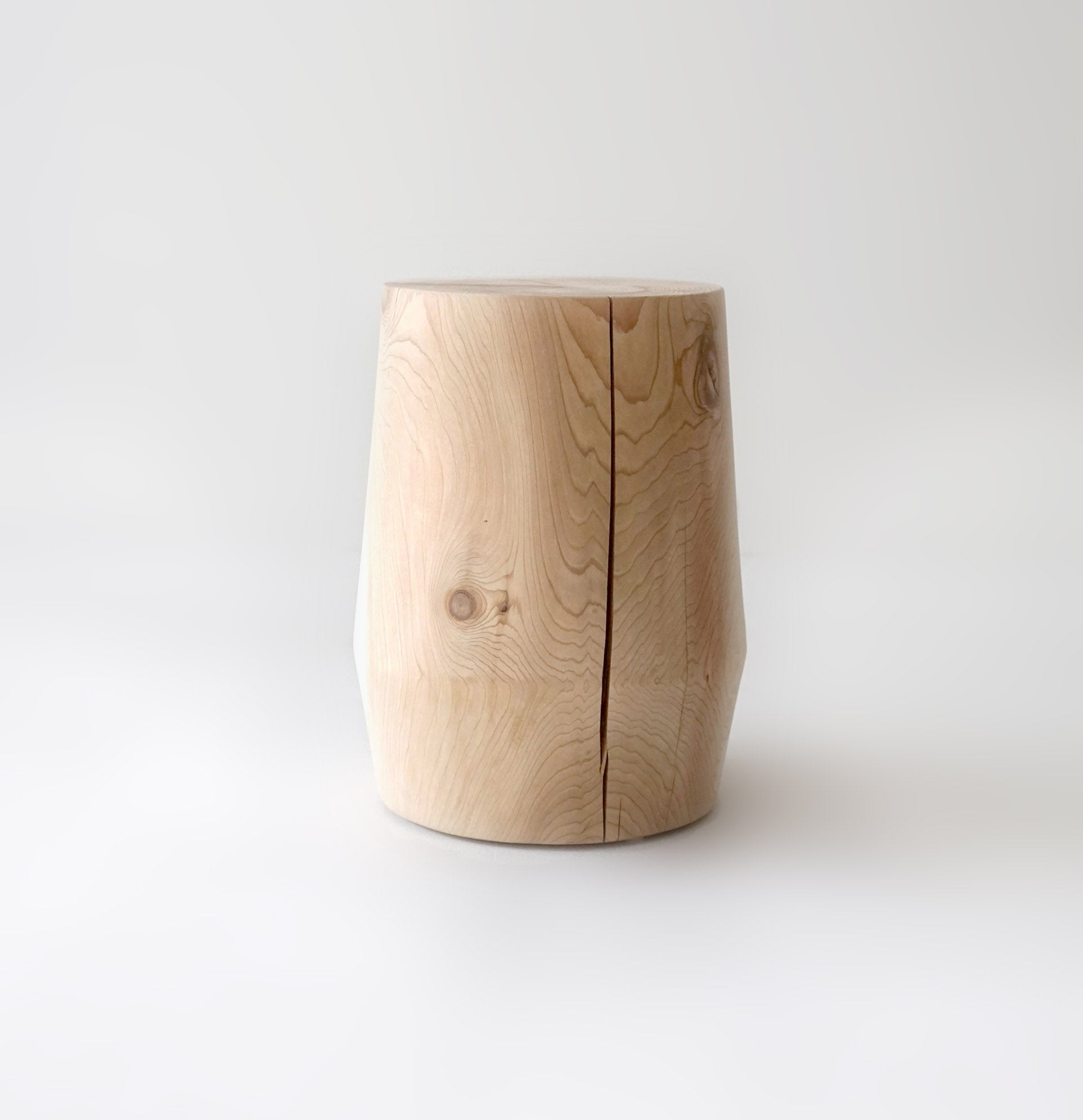 Solid hemlock smokestack stool with a crack